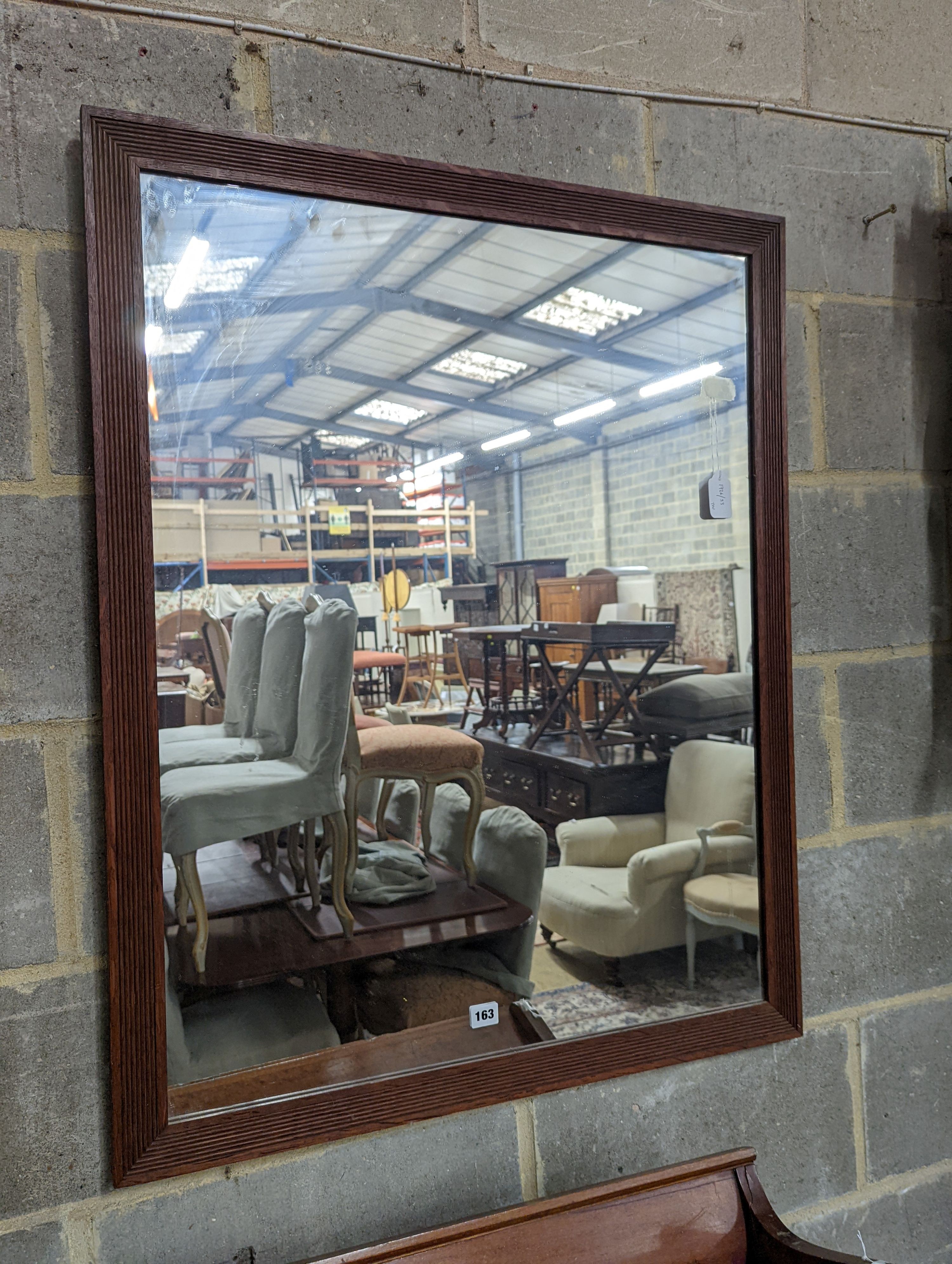An oak framed rectangular wall mirror with fluted border, width 79cm, height 99cm